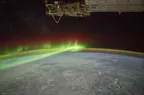 A stunning image of Aurora and Manicouagan Crater at night time thumbnail